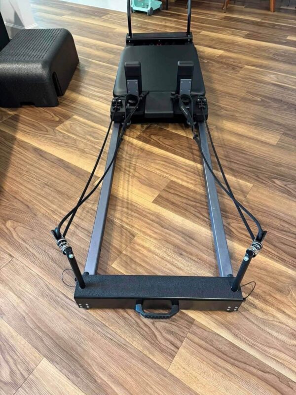 Balanced body metro IQ reformer    Brand new, used only a handful of times. Metro IQ foot strap and Pilates box included